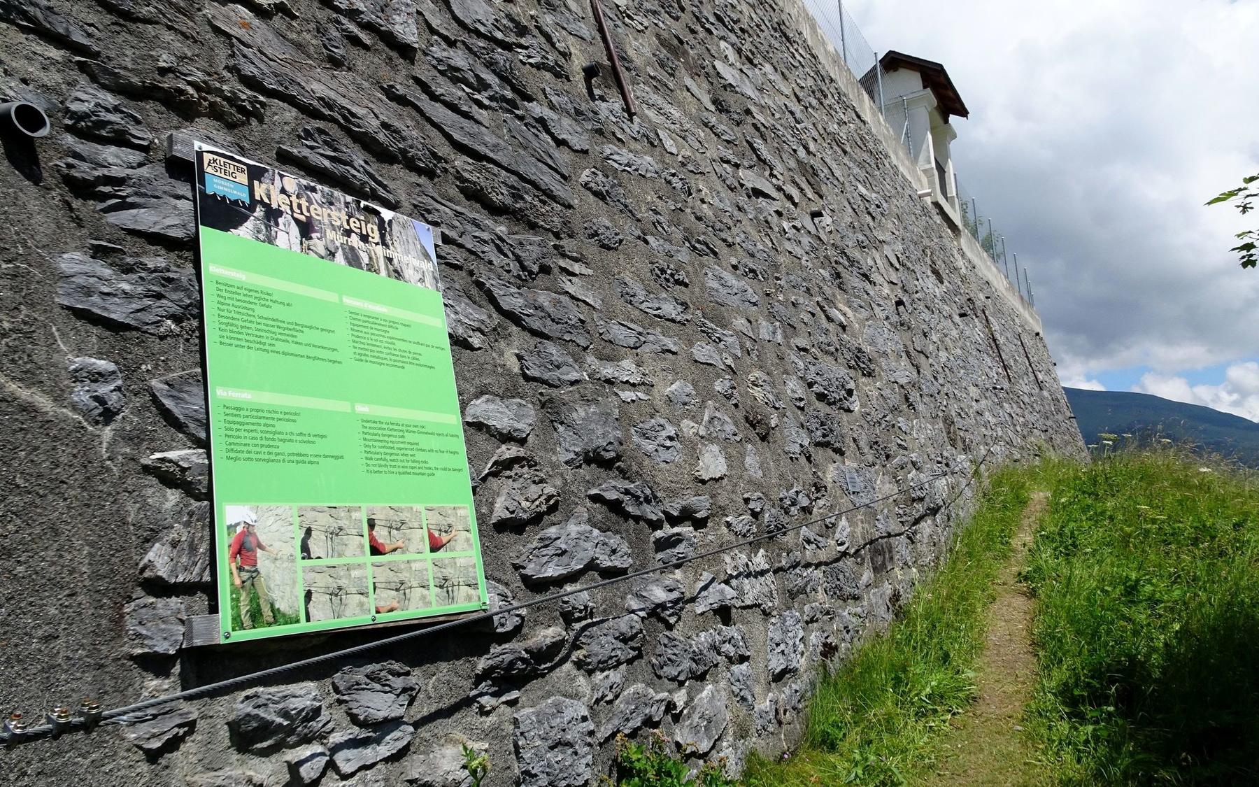 Overview board at the end of the tennis courts wall.