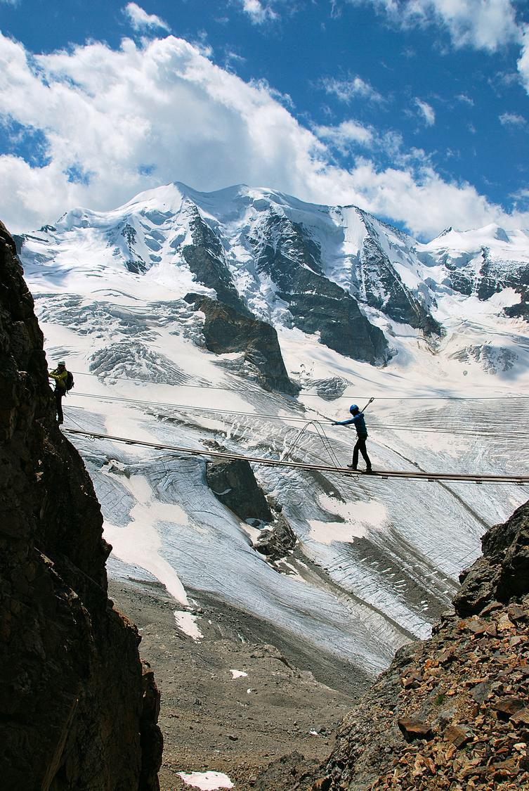 Suspension bridge, Piz Palü in the background.