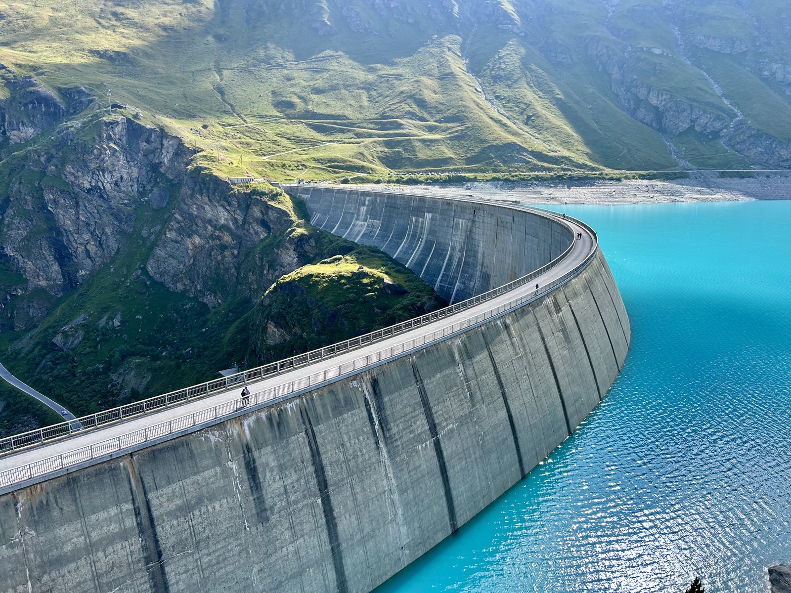 Lac de Moiry and its arch dam. The via ferrata climbs the flank opposite the wall.