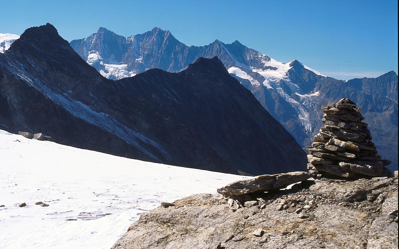 Rock and ice at Sonnigpass, the Mischabel group behind.