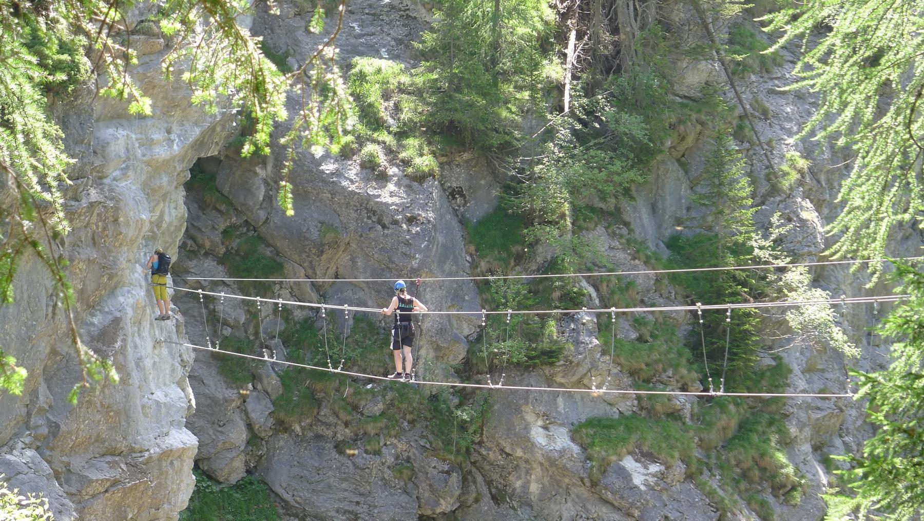 A three-cable bridge on the Gorges de Mauvoisin via ferrata, section two: Tichodrome