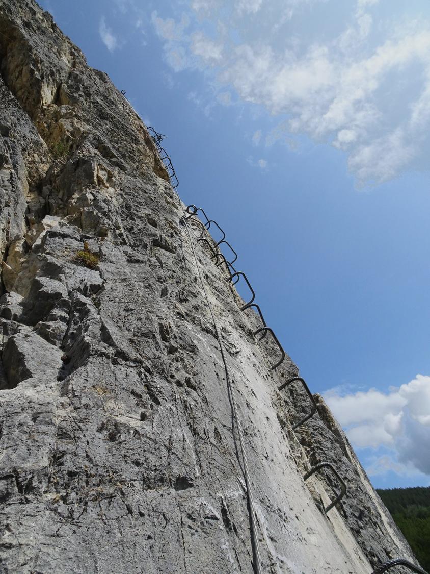 Climbing the slab of the last wall